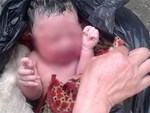 Thai phụ tạt đồ ăn nóng vào em bé một tuổi vì làm ồn-1