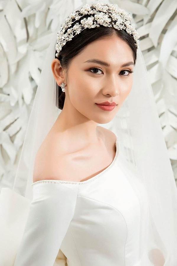 Sau khi công khai bạn trai, Á hậu Thuỳ Dung gợi cảm với váy cưới xuyên thấu-11