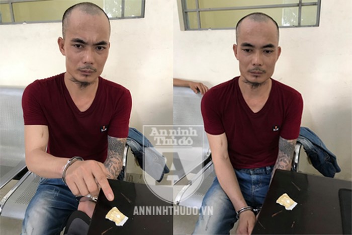 Gã đàn ông bị bắt vì mang hàng trắng còn ung dung đứng xem chốt 141-1