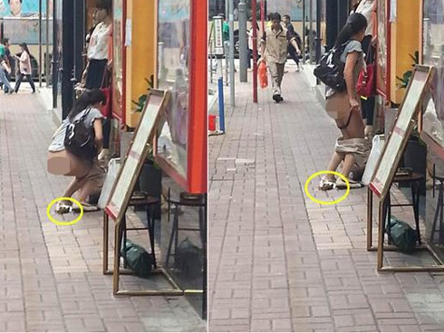 Hành động gây sốc của cô gái trong thang máy-1