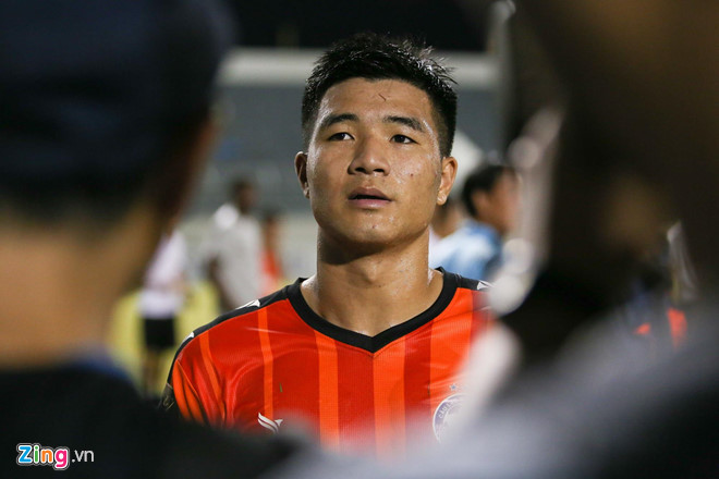 Hà Đức Chinh nghỉ 2-3 tháng vì chấn thương cổ chân-1