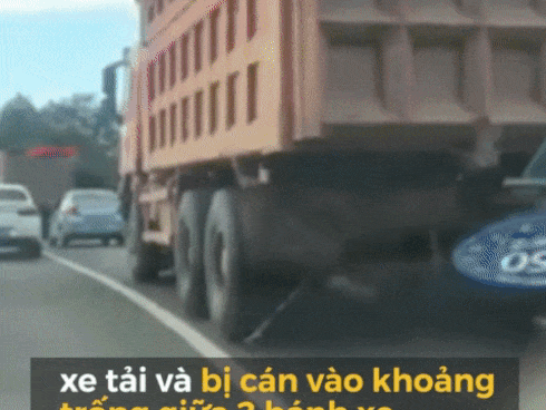 Người phụ nữ bò dậy sau khi bị xe tải chạy qua