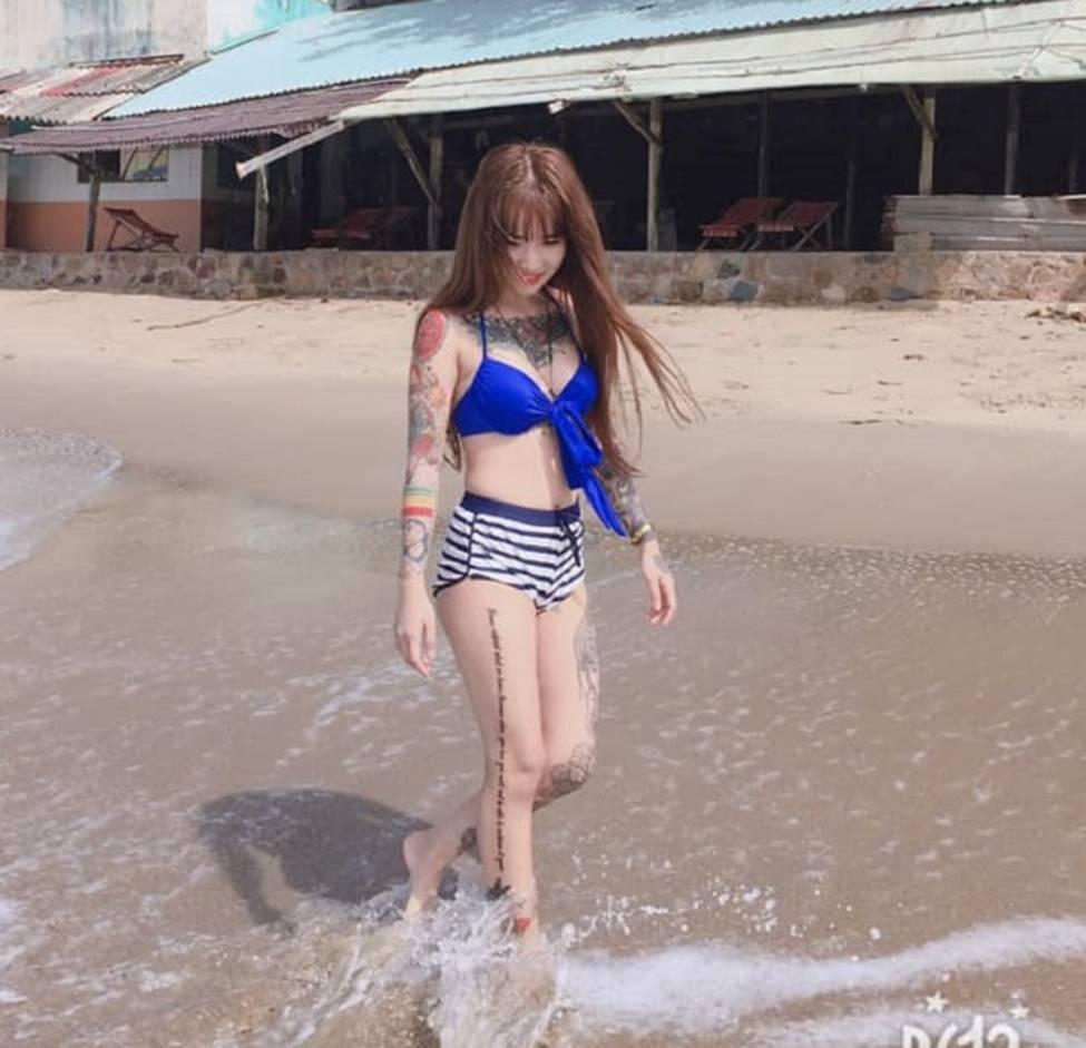 Thanh nữ An Giang, Quảng Nam bị giễu cợt vì xăm kín ngực, tay chân-1
