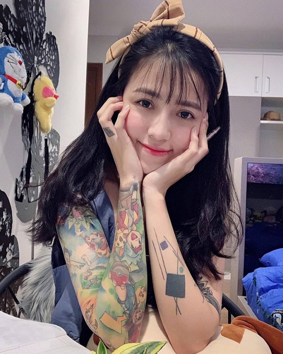 Thanh nữ An Giang, Quảng Nam bị giễu cợt vì xăm kín ngực, tay chân-16