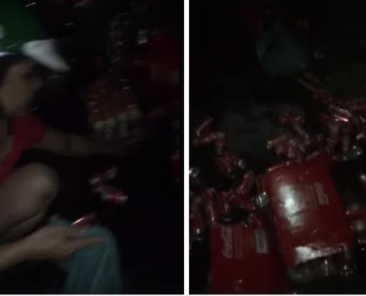 Xe chở nước ngọt bị đổ, 2 mẹ con thi nhau vác bao tải ra hôi của còn thách thức: Cứ quay phim, điện công an tới-1