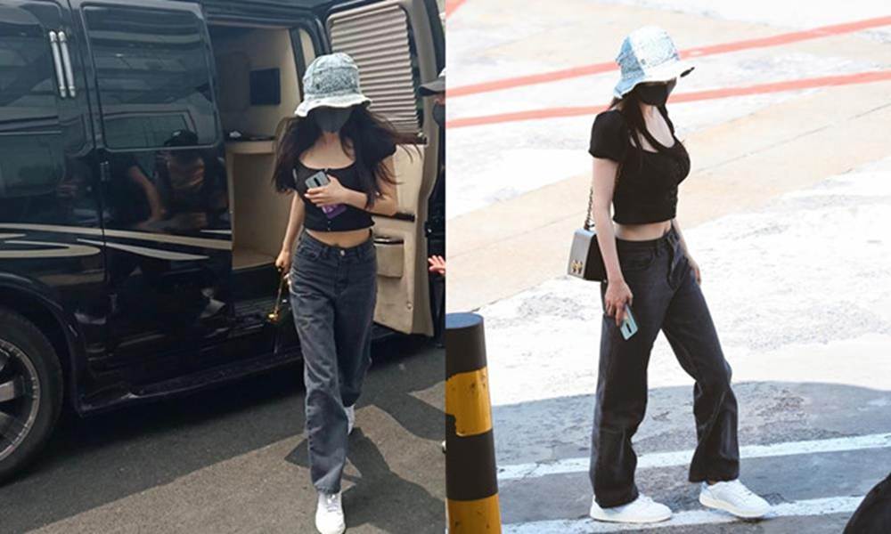 Dương Mịch khoe vòng một gợi cảm và eo thon ở sân bay-1