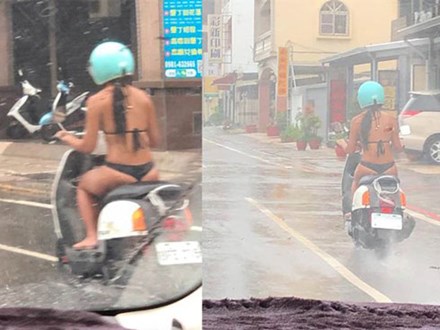 Mặc bikini bé xíu rồi lái xe máy giữa trời mưa, cô gái khiến dân tình 