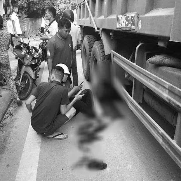 Mẹ cùng con gái 8 tuổi bị xe tải cuốn vào gầm trên đường đi khai giảng-1