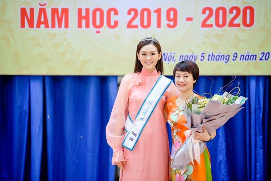 Á hậu Tường San xinh đẹp rạng rỡ khi mặc áo dài hồng do mẹ tự thiết kế-7