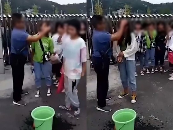 Thầy giáo đứng ở cổng trường, dùng khăn tẩy trang cho nữ sinh thì mới cho vào lớp-1