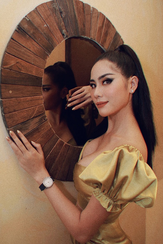 Hoàng Hạnh mặc gợi cảm, vướng nhiều tranh cãi trước khi thi Miss Earth-14