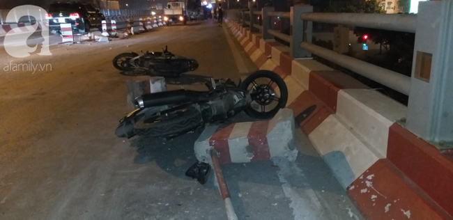 Xe bồn nổ lốp lao vào dải phân cách trên cầu Thanh Trì khiến 4 người đi xe máy bị thương-11