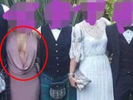 Mặc váy hở ngực xẻ tới tận rốn đi dự đám cưới, cô gái bị chỉ trích thậm tệ