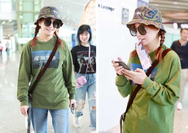 Hậu tin đồn ly hôn, Triệu Vy đội mũ xanh lá xuất hiện tại sân bay, ám chí bị cắm sừng?-3