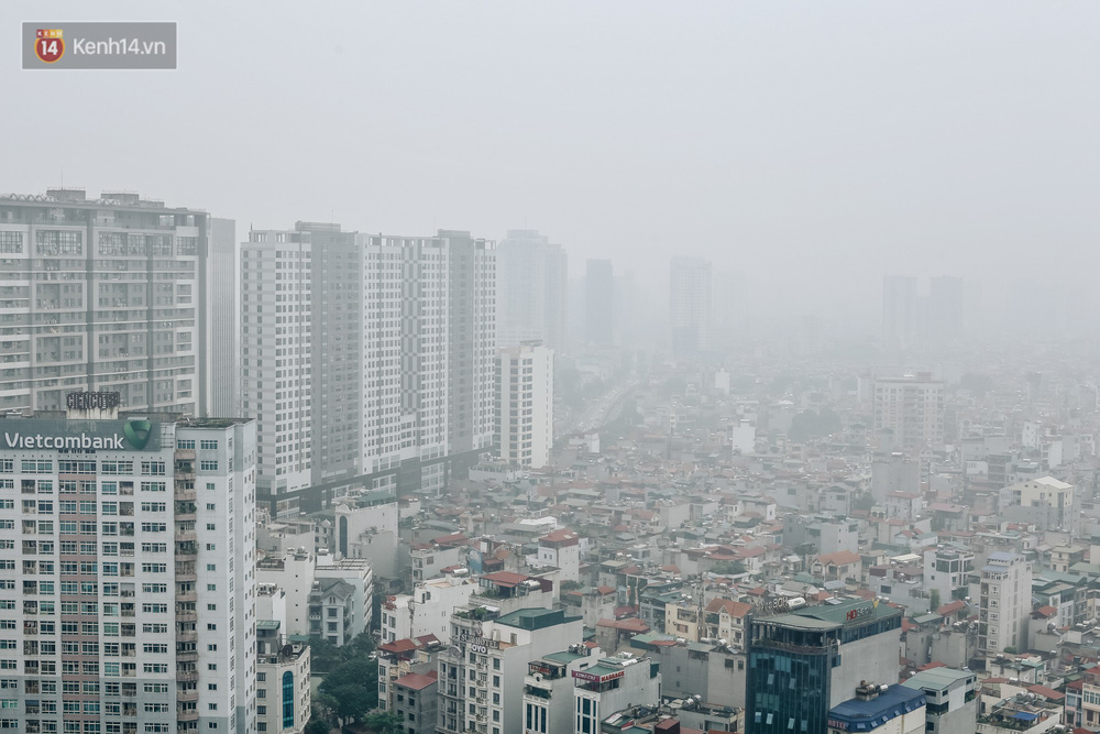 Chùm ảnh: Một ngày sau cơn mưa vàng, đường phố Hà Nội lại chìm trong bụi mù-2