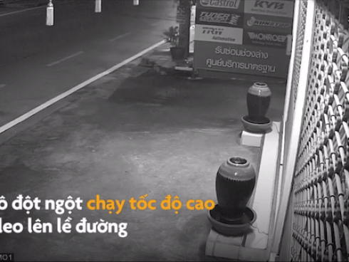 Ôtô phóng tốc độ cao, suýt tông trúng người lao công
