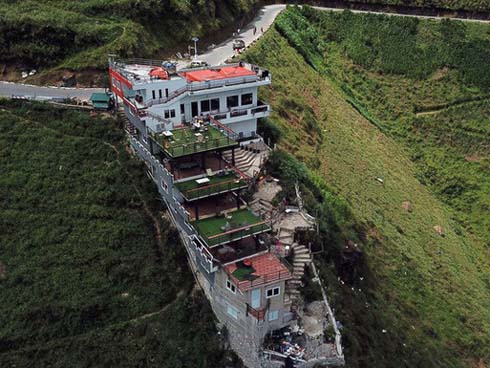 Nữ chủ nhân tòa nhà 7 tầng xây trái phép trên đèo Mã Pí Lèng là ai?-3