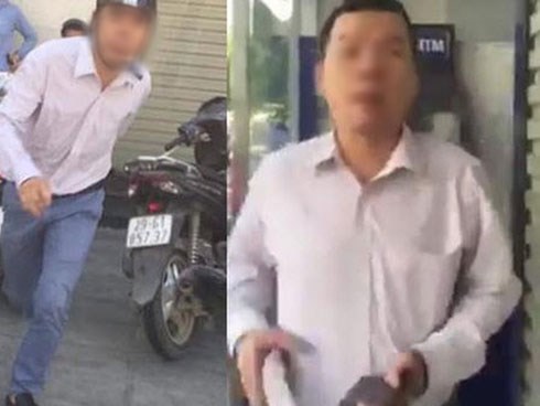 Gã đàn ông đánh tới tấp người phụ nữ tại cây ATM rồi hỏi