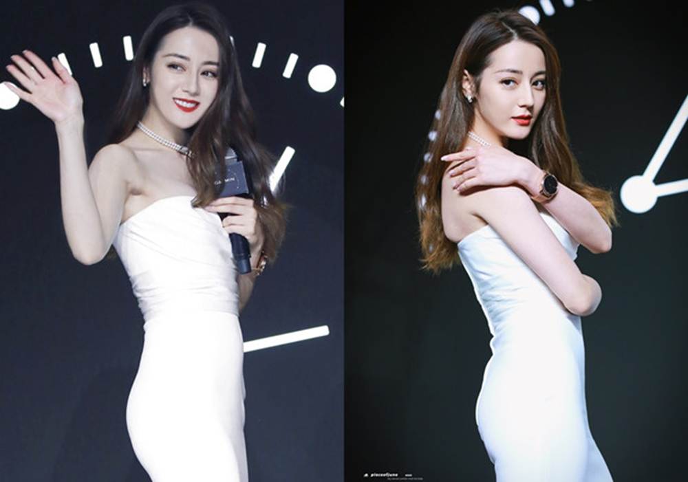 Địch Lệ Nhiệt Ba diện váy cúp ngực, liên tục dùng tay che chắn vòng 1-3