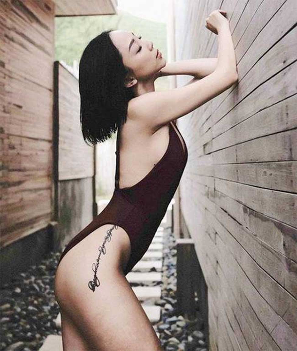 Hình xăm hiểm hóc nơi lườn, hông của Hòa Minzy, Bảo Anh... gây tò mò-3