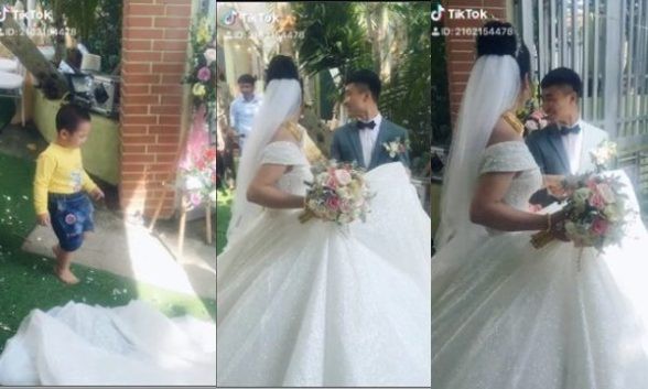 Biểu cảm trái ngược với cả hội hôn, cậu em trai trong bức ảnh ngày cưới chị gái thu hút mọi ánh nhìn-6