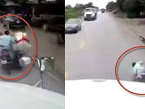 Suýt nằm dưới bánh container vì vượt ẩu