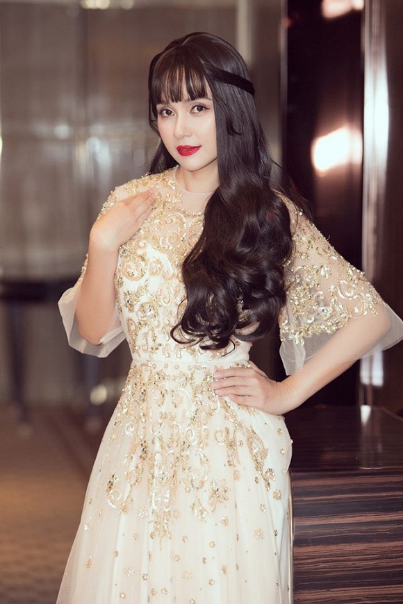 Nữ hoàng ảnh lịch Việt Trinh trẻ ra cả chục tuổi với tóc dài chấm hông-2