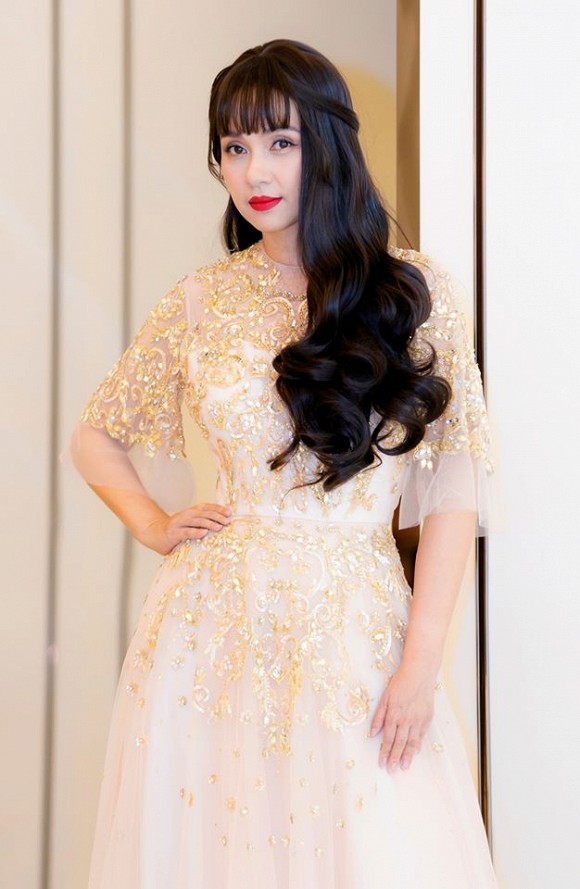 Nữ hoàng ảnh lịch Việt Trinh trẻ ra cả chục tuổi với tóc dài chấm hông-4