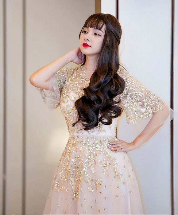 Nữ hoàng ảnh lịch Việt Trinh trẻ ra cả chục tuổi với tóc dài chấm hông-5