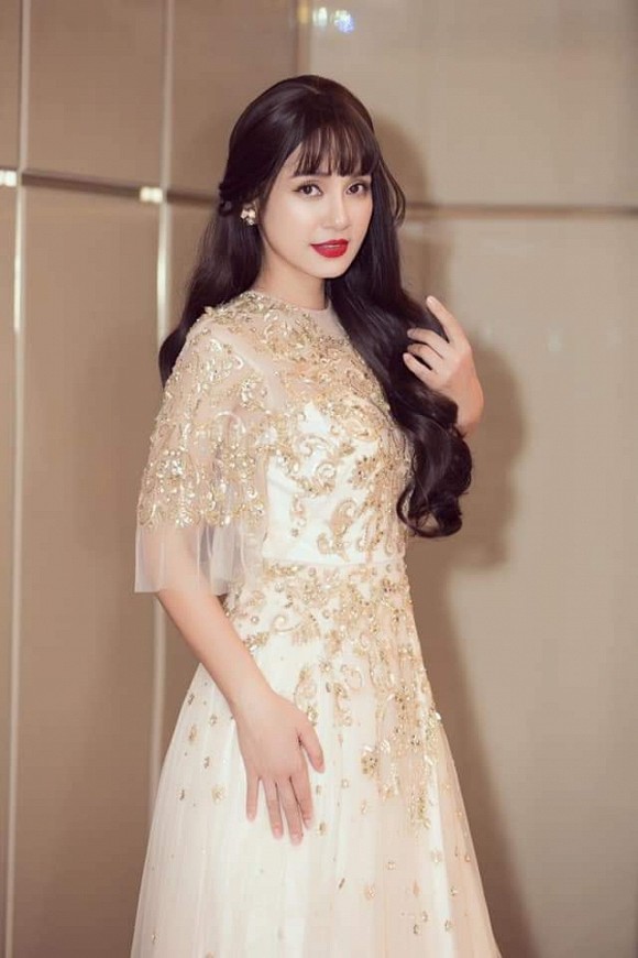 Nữ hoàng ảnh lịch Việt Trinh trẻ ra cả chục tuổi với tóc dài chấm hông-6