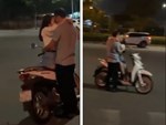 CLIP: Người phụ nữ hổ báo đập mũ bảo hiểm vào đầu tài xế Grabbike, chặn đầu xe máy không cho đi-2