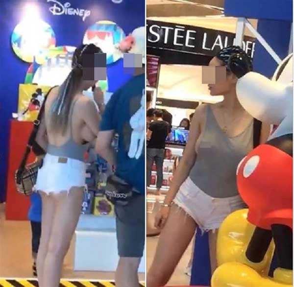 Mặc áo hở toang hoác như không, cô gái ngực một mét gây náo loạn rạp chiếu phim-1