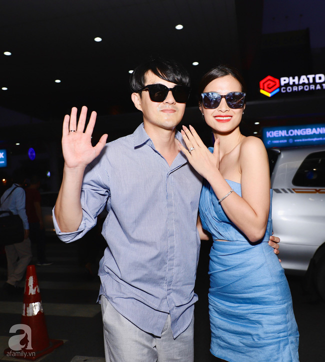 Đông Nhi - Ông Cao Thắng cực thời thượng xuất hiện tại sân bay về TP.HCM, tay trong tay không rời 1 giây-4