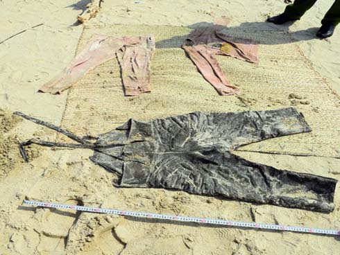 Vụ thi thể không đầu ở Quảng Nam: Hé lộ bất ngờ ý nghĩa dòng chữ TQ trên áo-4