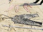 Sự trùng hợp giữa xác cô gái mất đầu và 25 bánh heroin chữ Trung Quốc tìm thấy trên bãi biển Quảng Nam-4
