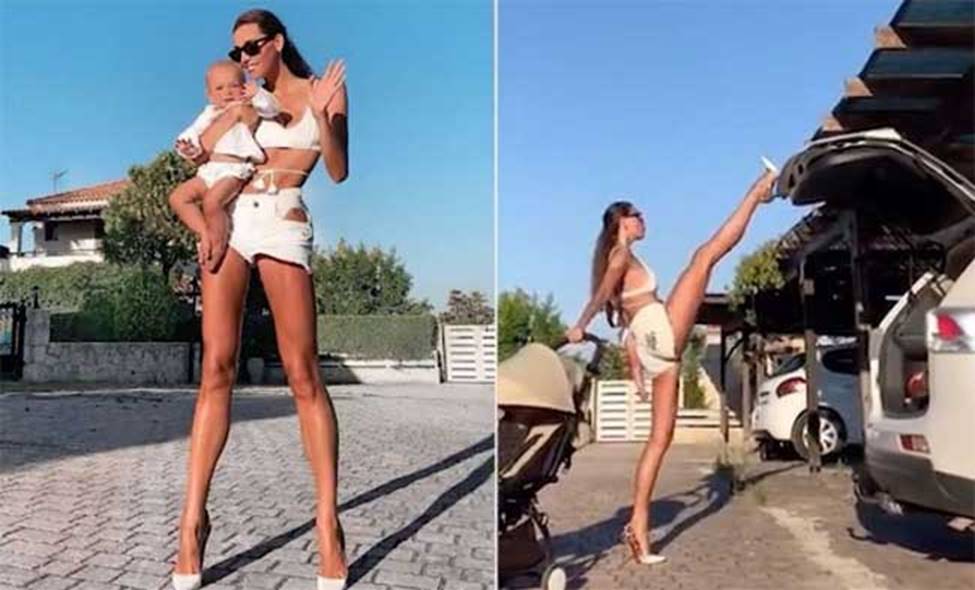 Người phụ nữ Nga có cặp giò dài gần nhất thế gian, lấy chân đóng cốp xe điệu nghệ-7