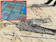 Sự trùng hợp giữa xác cô gái mất đầu và 25 bánh heroin chữ Trung Quốc tìm thấy trên bãi biển Quảng Nam