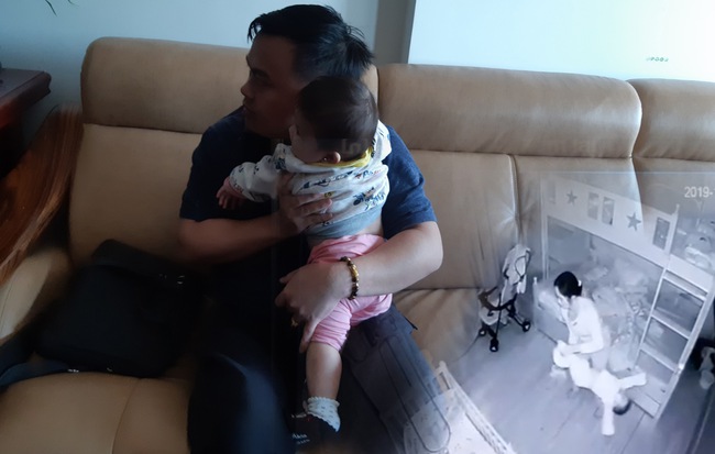 Xem video con bị giúp việc dốc ngược lắc qua lắc lại mà tôi chết lặng, không dám xem hết-1