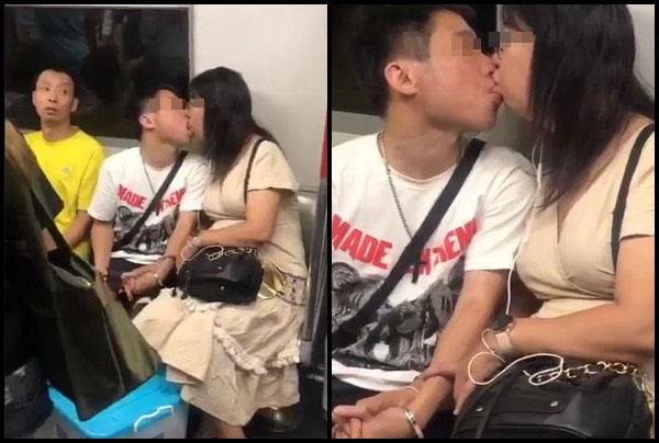 Choáng với cảnh đôi nam nữ thản nhiên hôn nhau cuồng nhiệt trên tàu điện ngầm, dân mạng bất lực sau khi xem clip-1