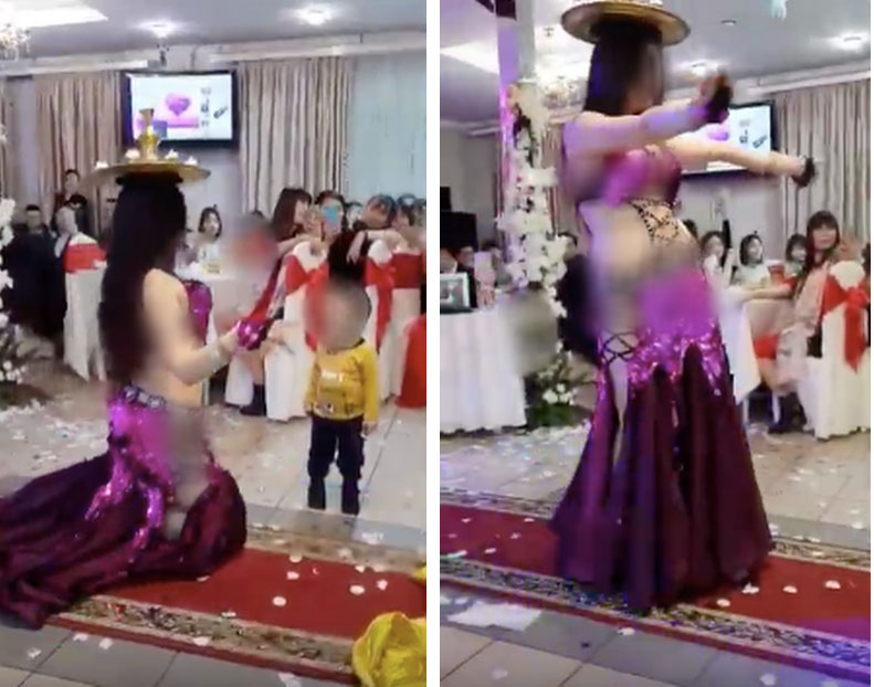 Hình ảnh hai cô gái ăn mặc hở hang vô tư uốn éo, múa bụng trước mặt trẻ con trong đám cưới gây xôn xao-1