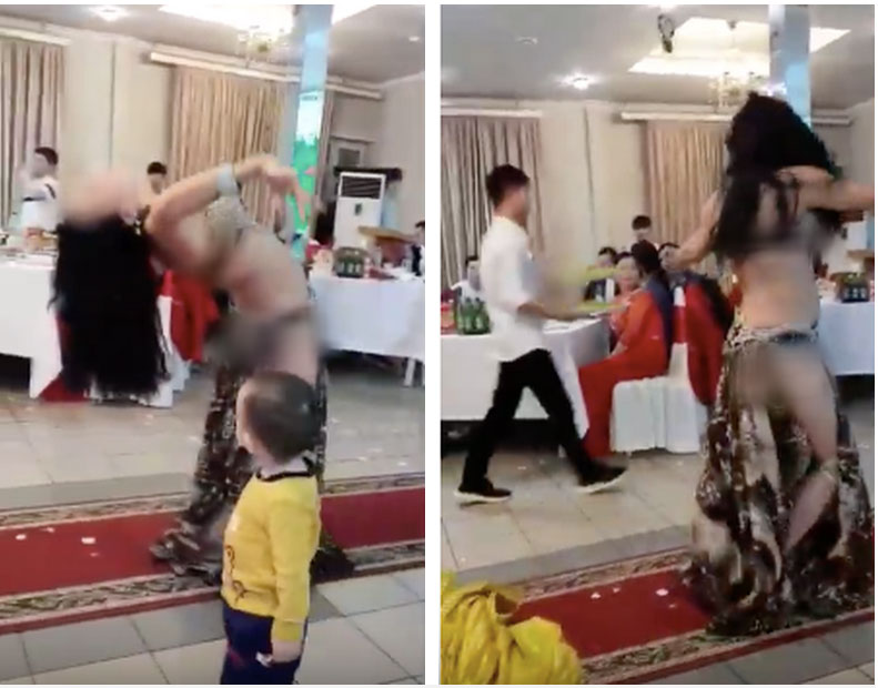 Hình ảnh hai cô gái ăn mặc hở hang vô tư uốn éo, múa bụng trước mặt trẻ con trong đám cưới gây xôn xao-2