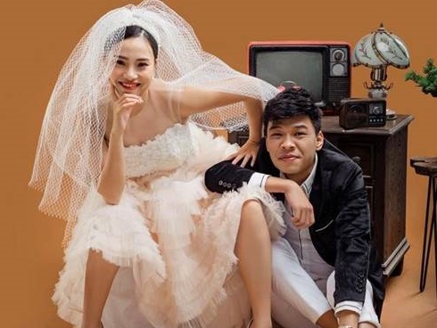 Thu Quỳnh khoe vòng 1 gợi cảm trong ảnh lịch đón năm mới-13