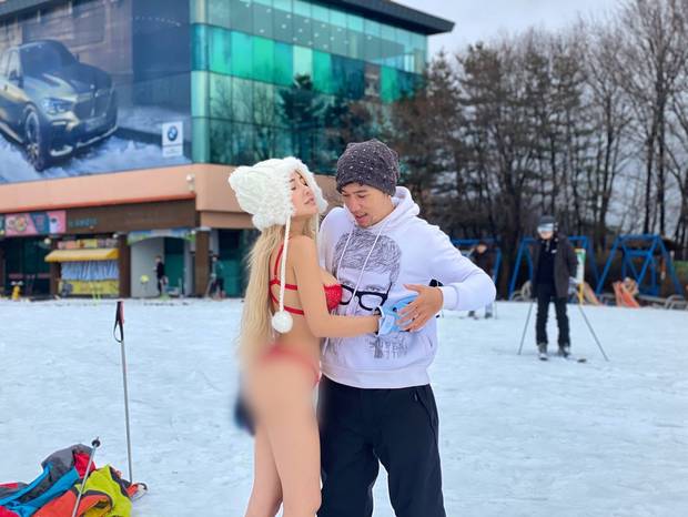 Dân mạng ném đá thẳng tay khi Ngân 98 diện bikini dưới tuyết -6 độ C ở Hàn, Lương Bằng Quang còn lấy hình ảnh câu view cho kênh Youtube-1