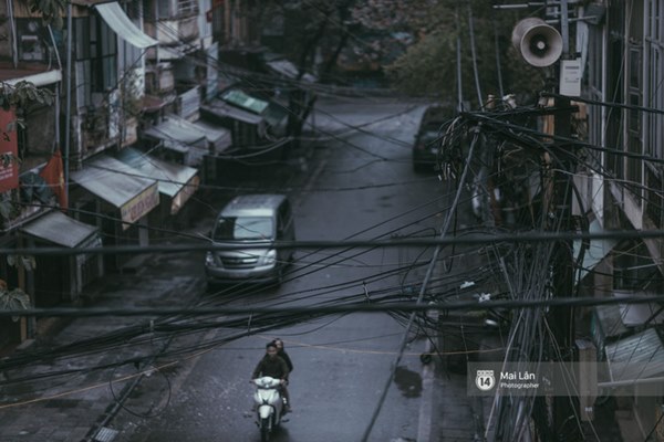 Hà Nội sáng mùng 1 Tết Canh Tý: Sau trận mưa lớn đêm 30, đường phố vắng vẻ như trong cuốn phim cũ nhuốm màu thời gian-15