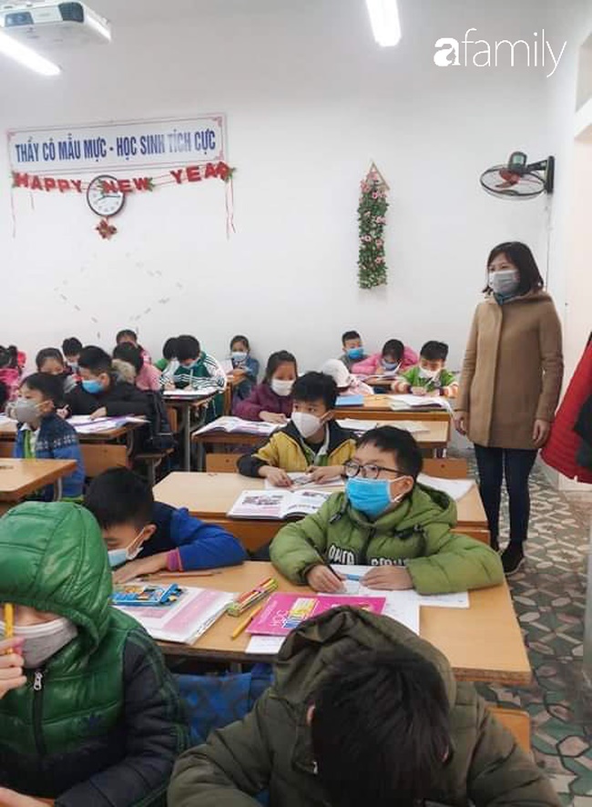 Trước thông tin phát hiện thêm trường hợp nhiễm virus Corona, một trường học ở Hà Nội yêu cầu 100% học sinh đeo khẩu trang đến lớp-1