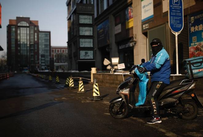 Cảnh tượng hiếm thấy: Hàng triệu người trở lại làm việc nhưng các siêu đô thị Trung Quốc vẫn chìm trong hôn mê vì virus corona-3