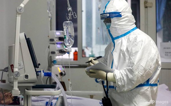 Các nhà nghiên cứu TQ: Đỉnh điểm dịch bệnh do virus COVID-19 đã qua, nguy cơ tái bùng phát vẫn còn-1