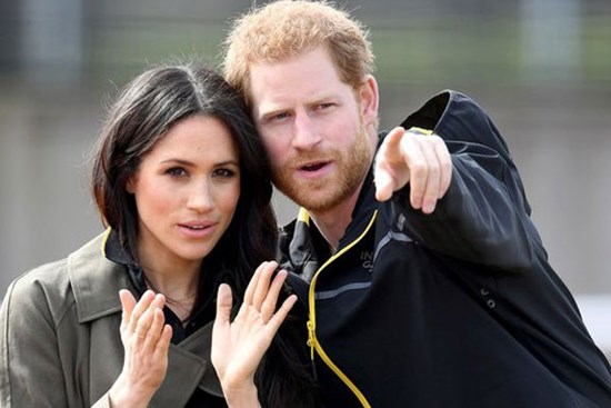 Chưa chính thức rời khỏi hoàng gia Anh, vợ chồng Meghan Markle 