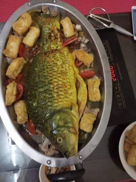 Bà chị chợ đầu mối tiết lộ bí mật cá chép nuôi gắn mác cá sông bán khắp chợ-4