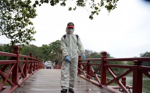 Dịch Covid-19 sẽ kéo dài tới khi nào, có biến mất như SARS: Phân tích của chuyên gia dịch tễ-1